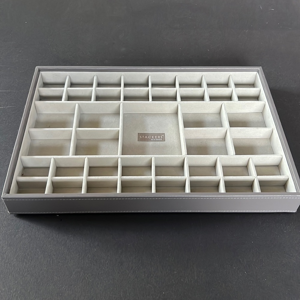 Stackers jewelry organizer from the Container Store.
